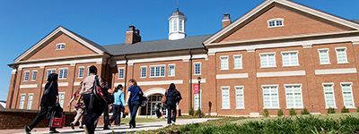 Students walk into a building on the Griffin campus
