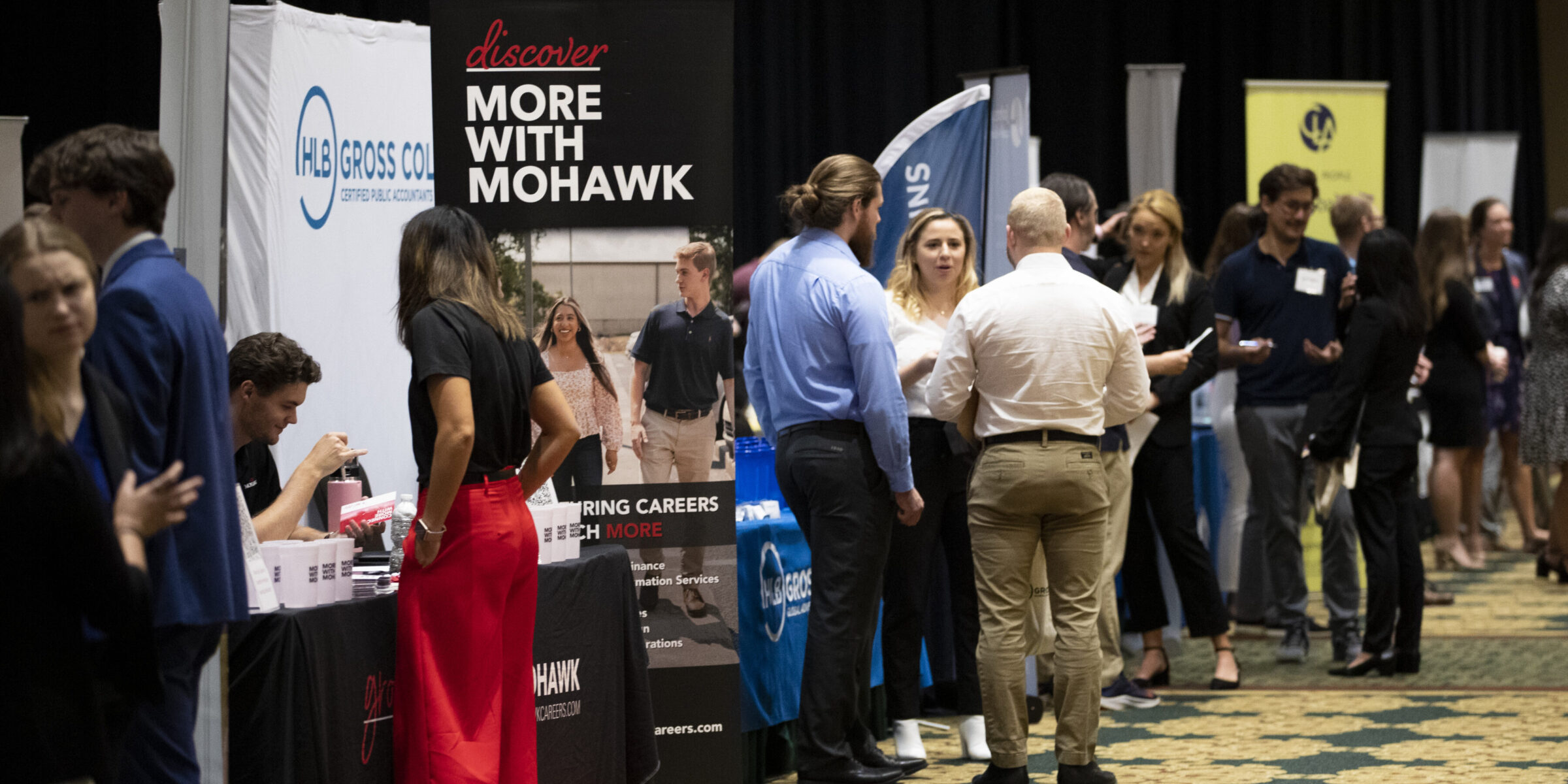 Students and employers at a career fair.