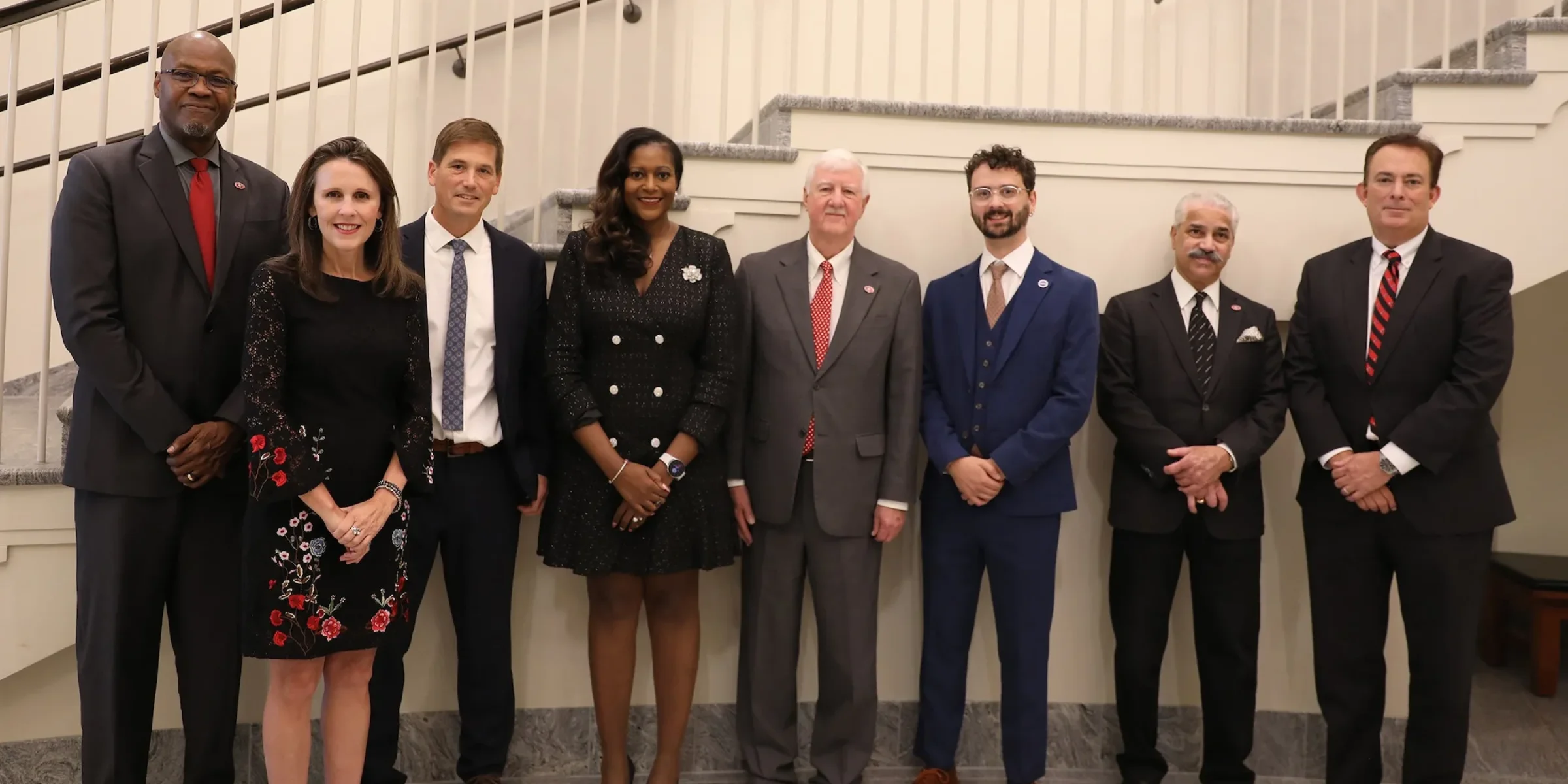 From left to right, Ron Walcott, Vice Provost for Graduate Education and Dean of the Graduate School; Catherine Bradshaw; Matthew Bonds; Adrienne Madison; Bob Izlar; Caleb Adams; Sangram Sisodia; Benjamin Ayers, Senior Vice President for Academic Affairs and Provost. (Photo by Nikki Mottley)