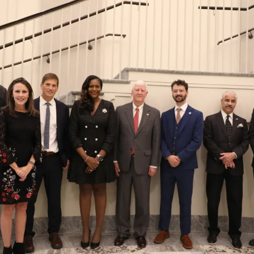From left to right, Ron Walcott, Vice Provost for Graduate Education and Dean of the Graduate School; Catherine Bradshaw; Matthew Bonds; Adrienne Madison; Bob Izlar; Caleb Adams; Sangram Sisodia; Benjamin Ayers, Senior Vice President for Academic Affairs and Provost. (Photo by Nikki Mottley)
