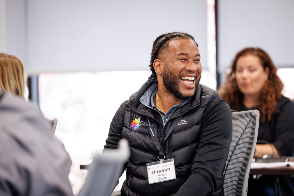 A candid photo of a guy laughing