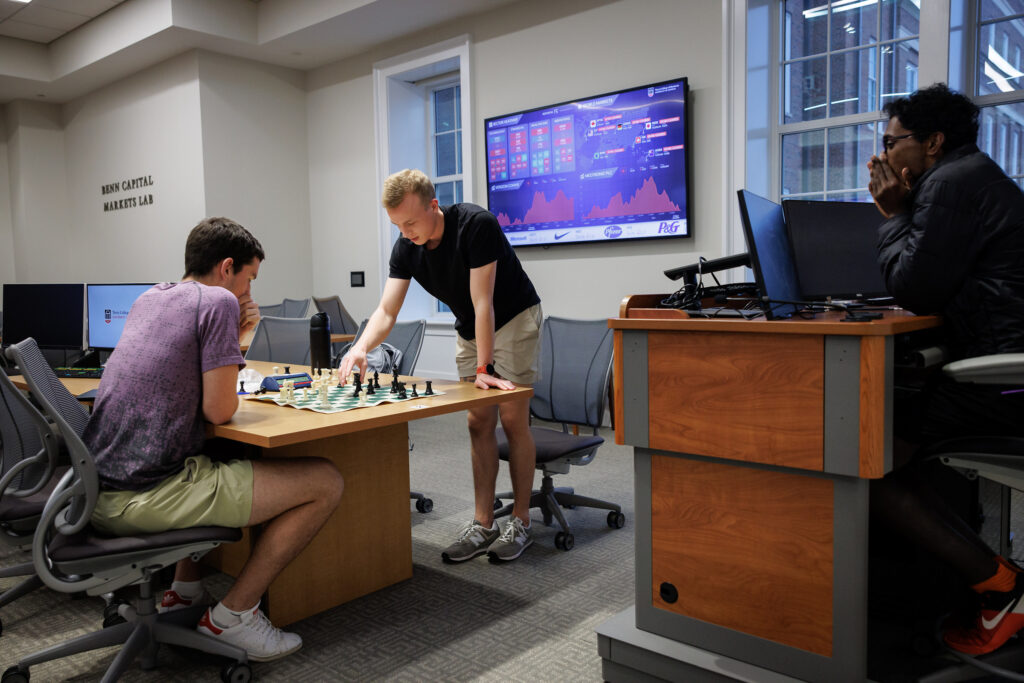 Students playing chess