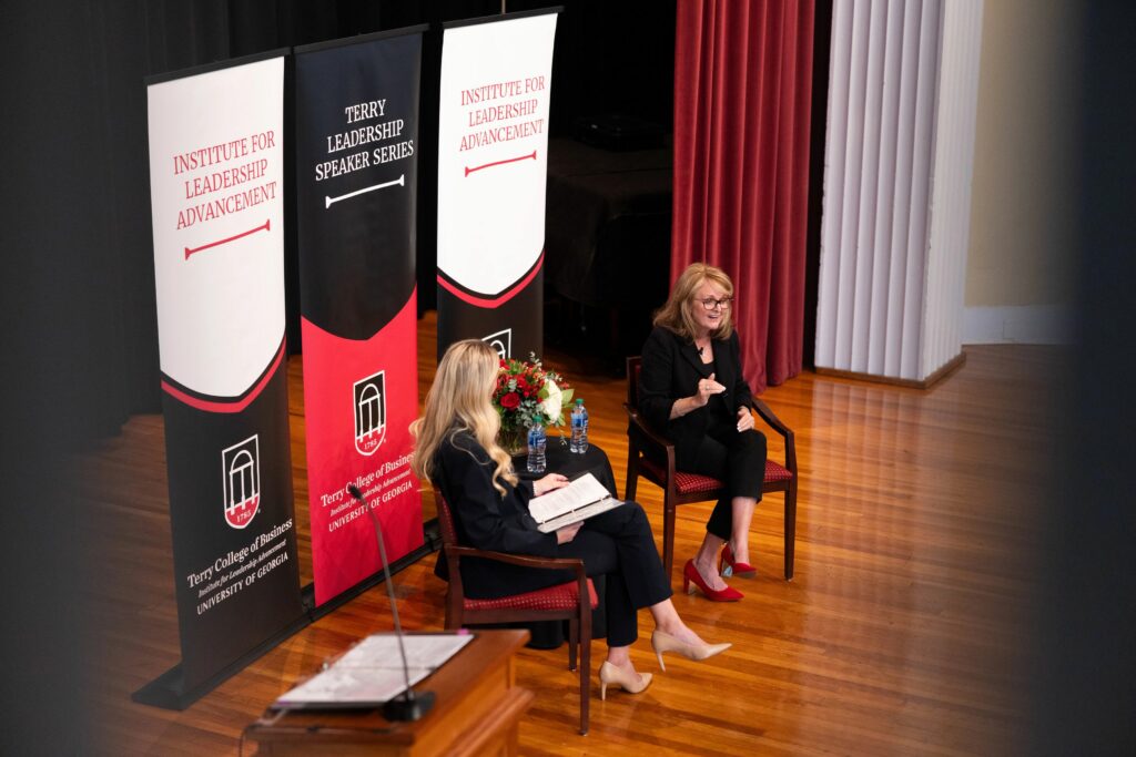 COX Communications COO Colleen Langner on stage at the UGA Chapel