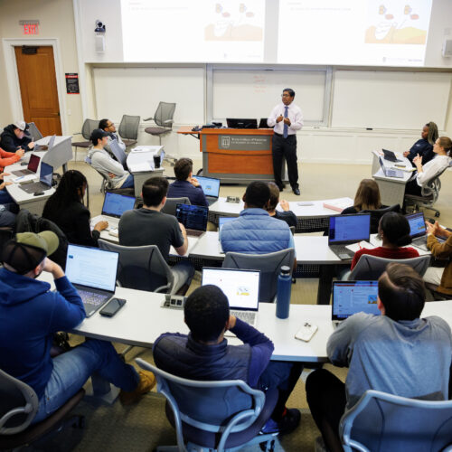 Santanu Chatterjee teaches a MBA course in a large classroom at the UGA Terry College of Business.