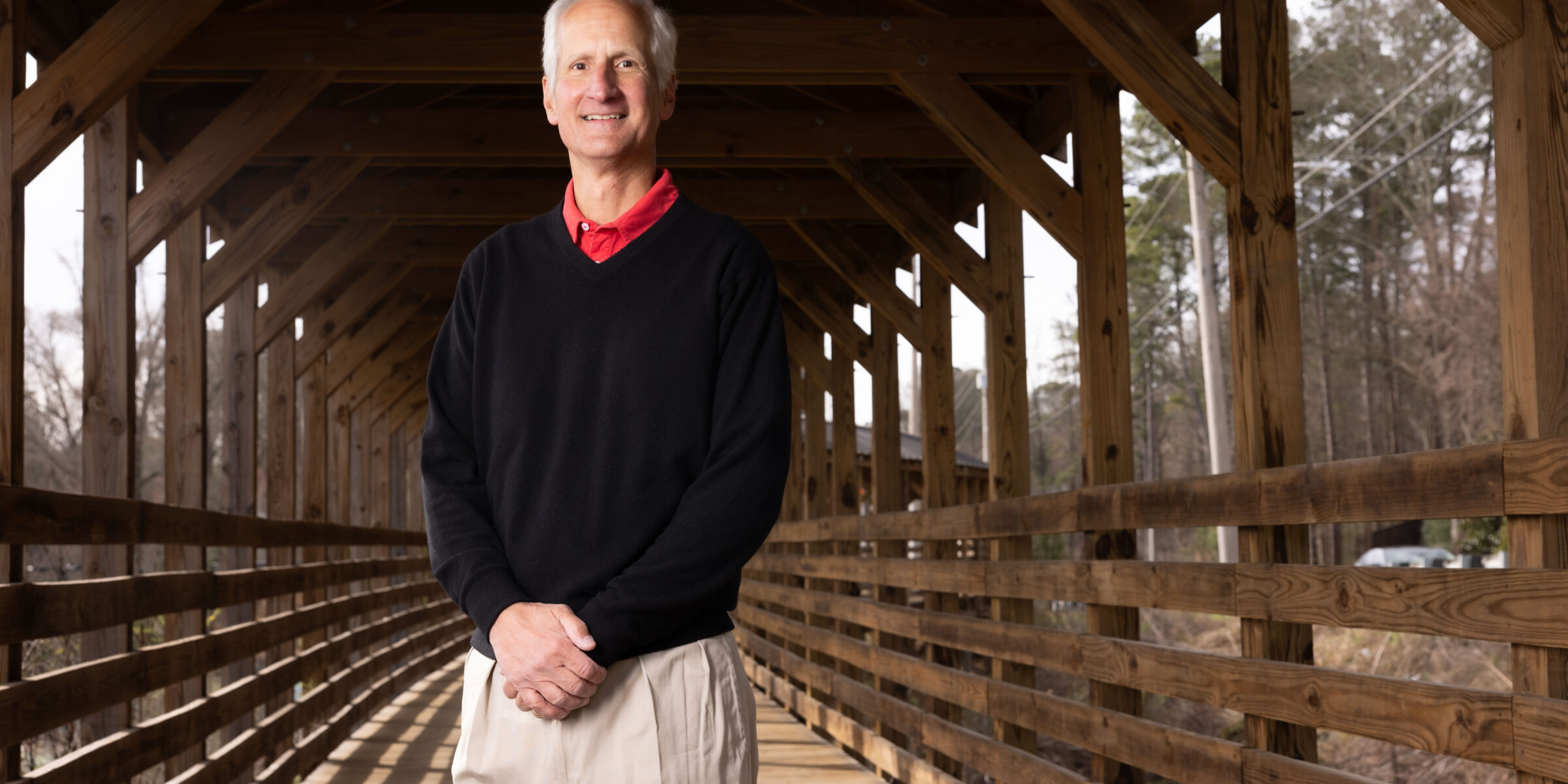 UGA Foundation Chairman Howard Young stands on a covered bridge