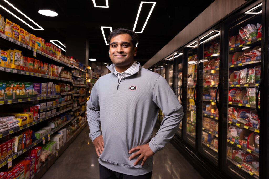Saajan Patel standing in Prince Market