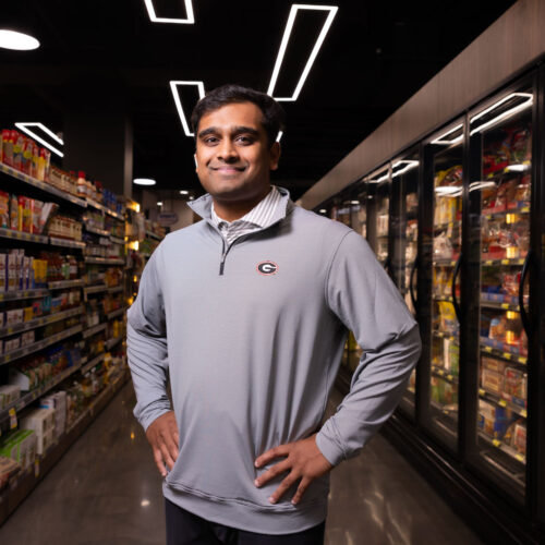 Saajan Patel standing in Prince Market