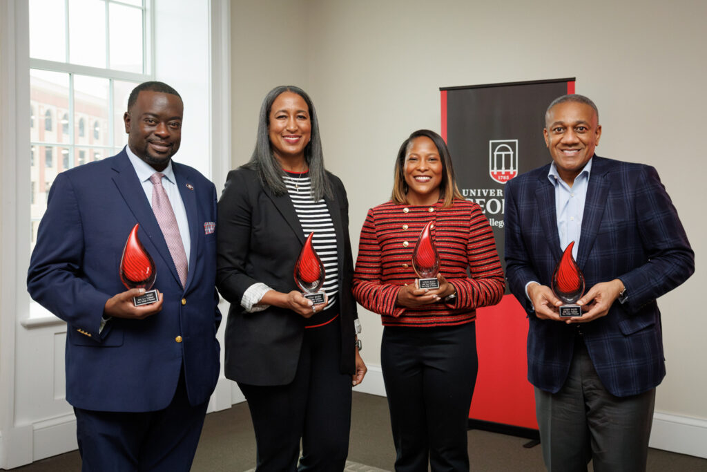 Christen Wright, Tiffany Daniels, La'Vonda McLean and Anthony Walker stand with their Terry Trailblazers Awards.