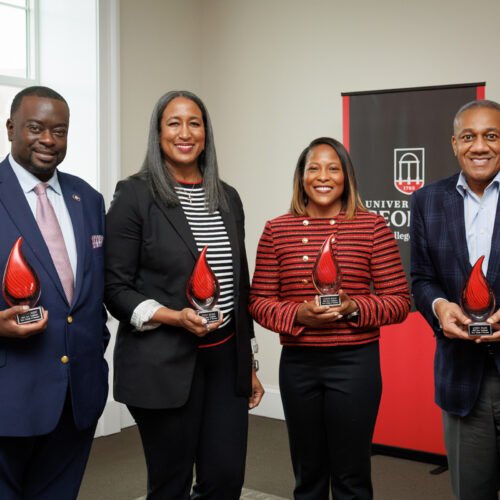 Christen Wright, Tiffany Daniels, La'Vonda McLean and Anthony Walker stand with their Terry Trailblazers Awards.