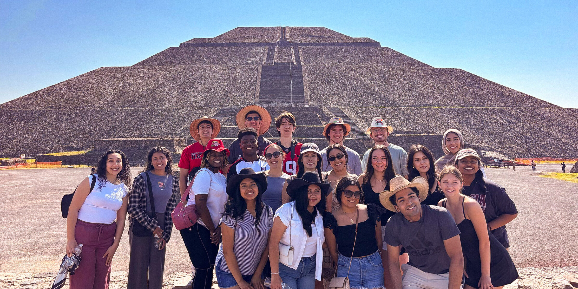 Students pose in front of an Teotihuacan pyramid outside of Mexico City.