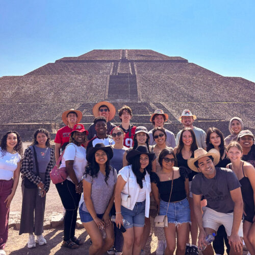 Students pose in front of an Teotihuacan pyramid outside of Mexico City.