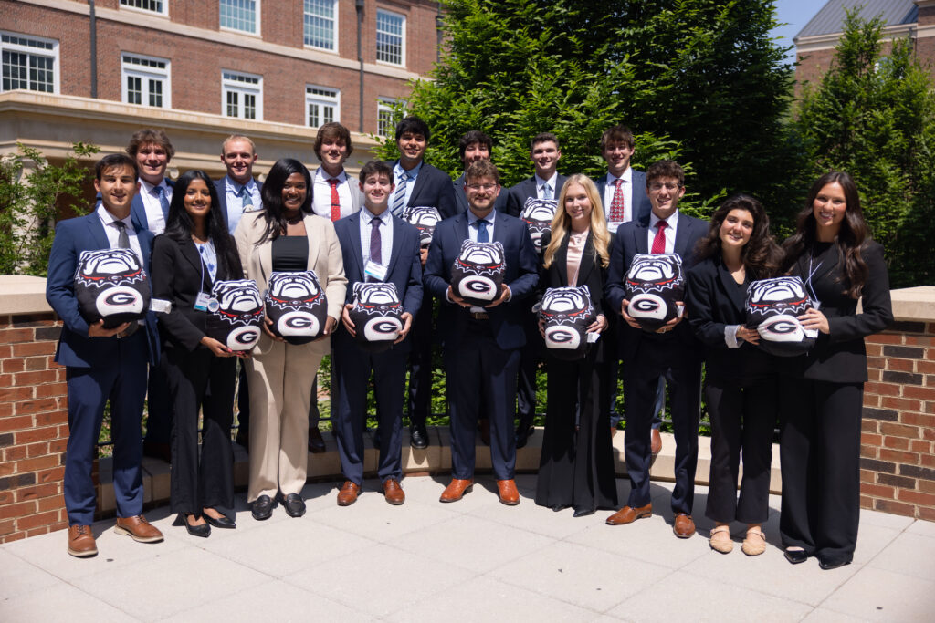 Winners of the Terry College Top Dawgs Sales Competition pose for photos.