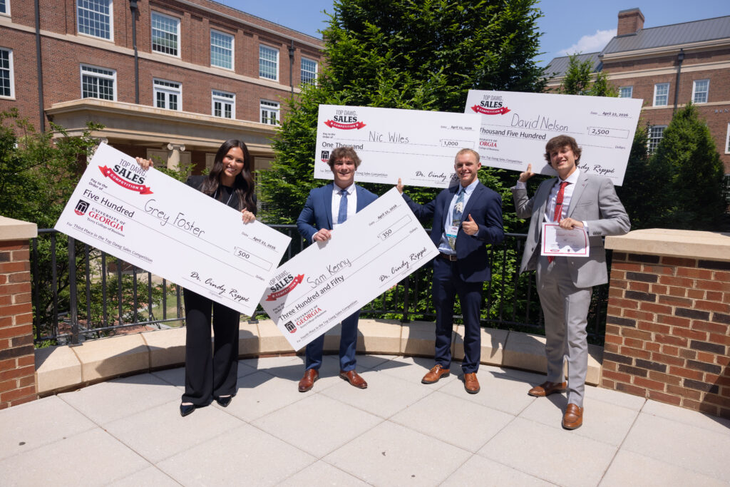 Winners of the Terry College Top Dawgs Sales Competition pose for photos.