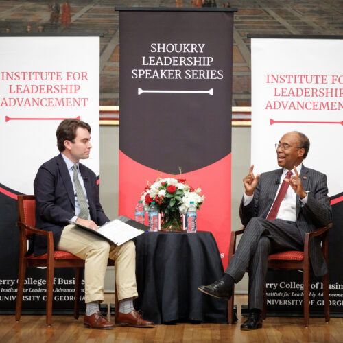 Brandon Cox, an ILA alumnus, interviews Federal Judge Steve Jones on stage at the UGA Chapel.