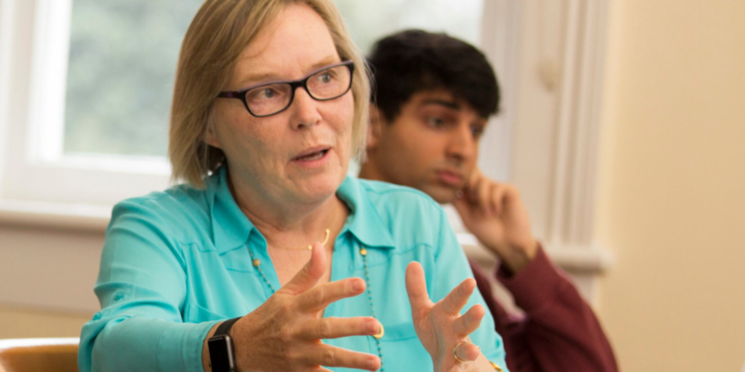 Annette Poulsen teaching in small classroom