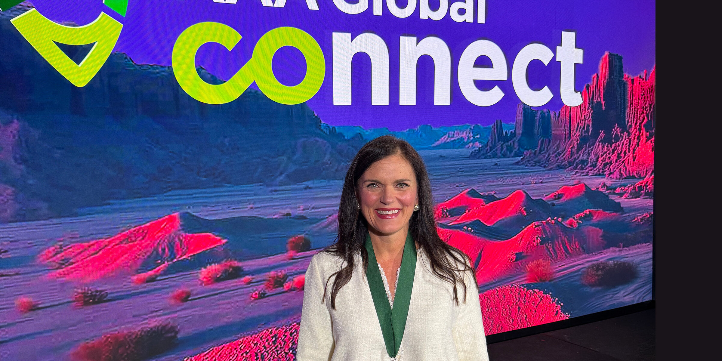 Tina Carpenter in front of AAA Global Connect