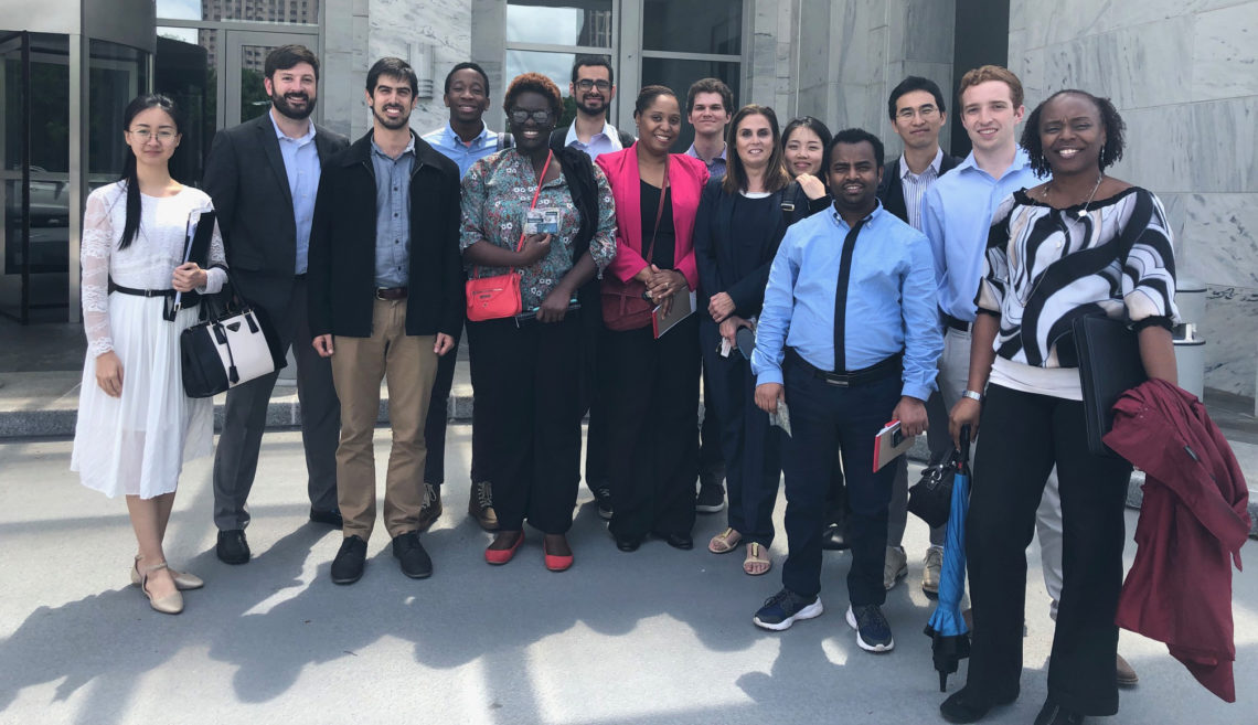 University of Georgia graduate students poses for a photo outside of the Federal Reserve Bank of Atlanta