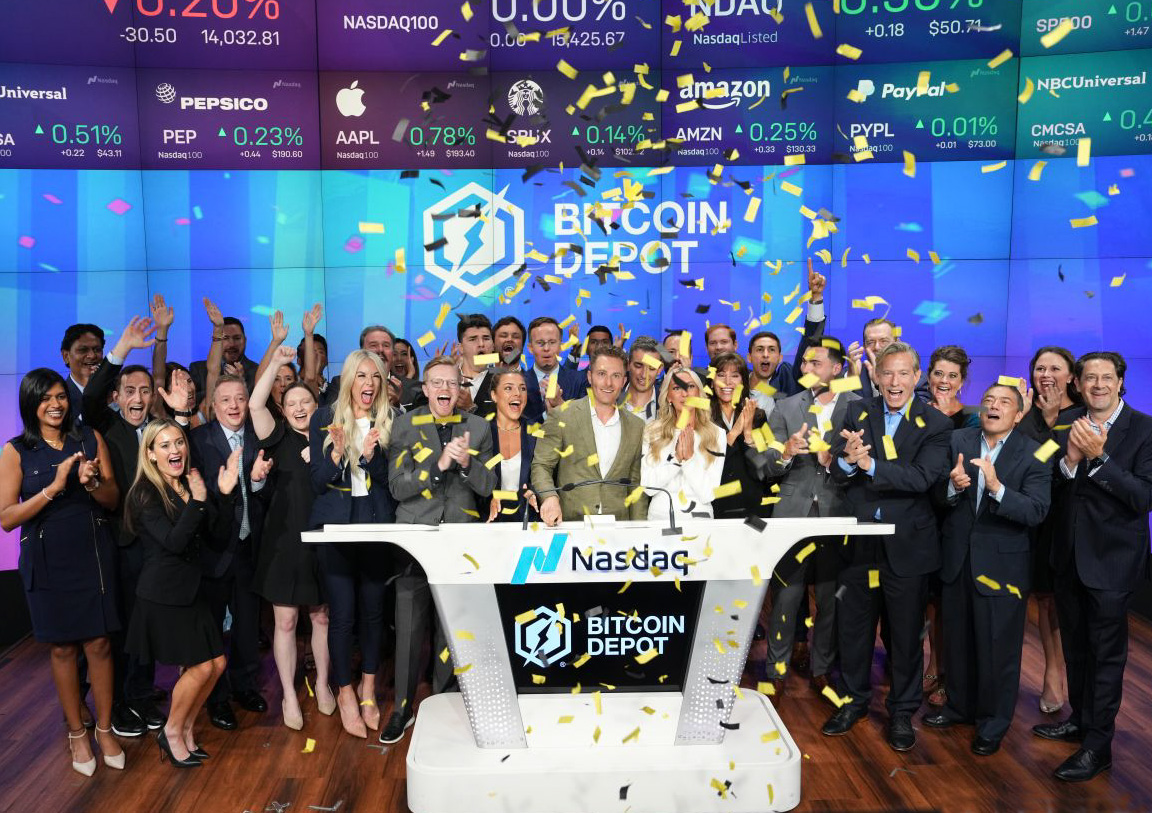Brandon Mintz's family and the staff of Bitcoin Depot celebrate after ringing the bell at the NASDAQ.