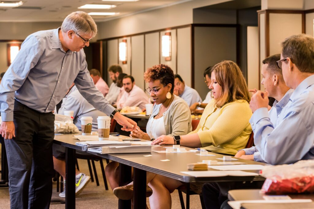Terry College Executive MBA Program students complete an activity during a class.