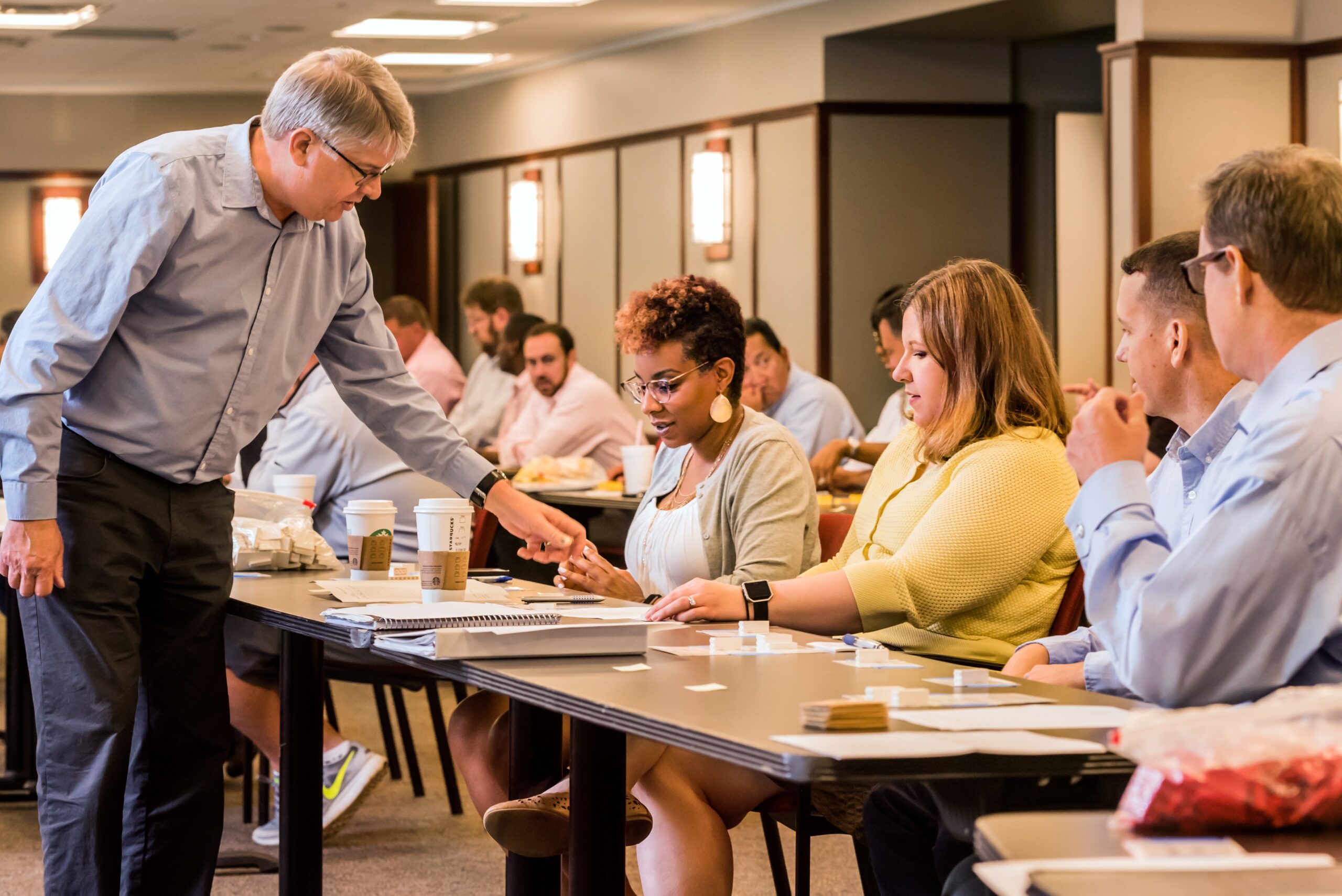 Terry College Executive MBA Program students complete an activity during a class.