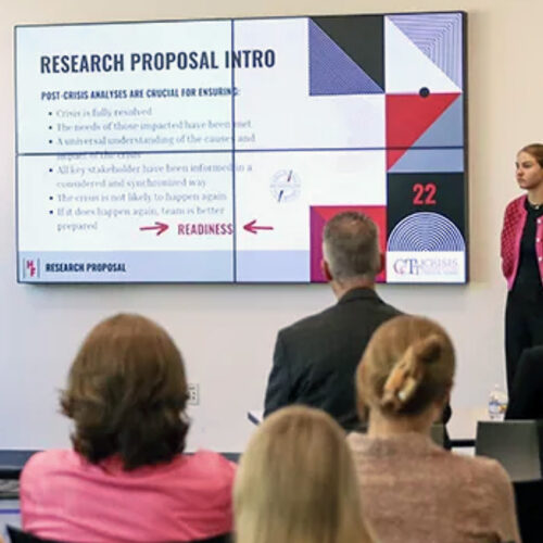 Graduate students present a crisis communication plan at Grady College of Journalism and Mass Communications