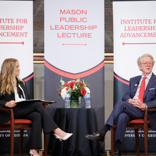 ILA Student EB Billings interviews Aflac CEO Dan Amos on stage at the UGA Chapel