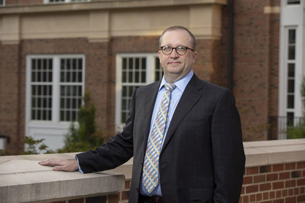 Terry College professor David Eckles poses for a photo at the Business Learning Community.