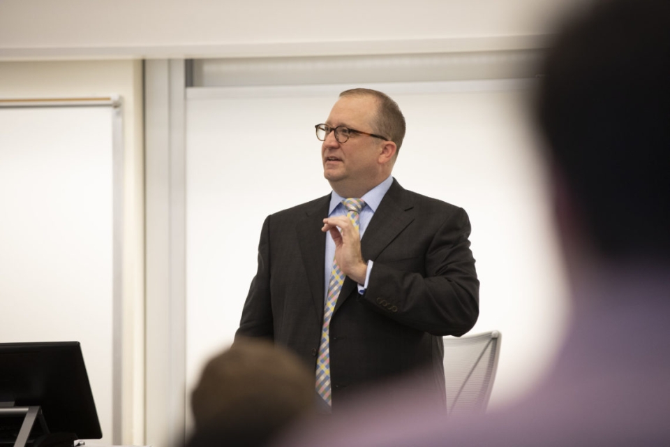 Terry College professor David Eckles teaches a class during one of his lectures.