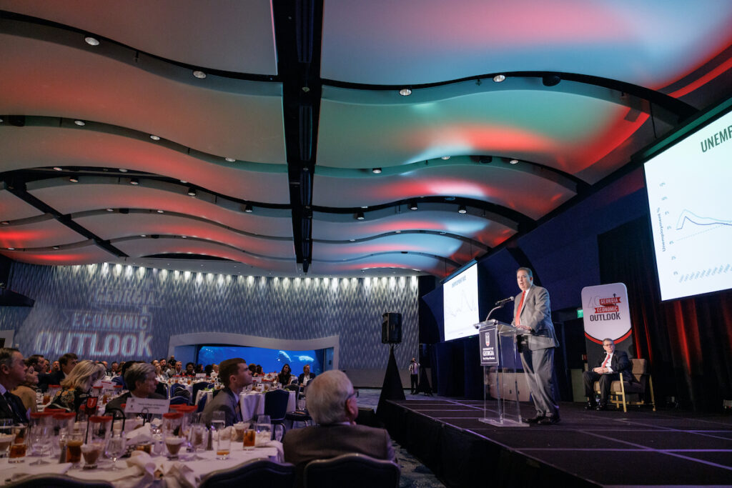 Dean Ayers speaks to a crowd at the 2023 Georgia Economic Outlook.