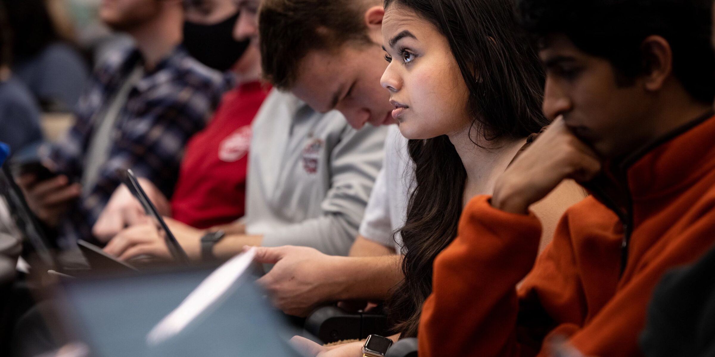 Students in classroom studying and taking notes