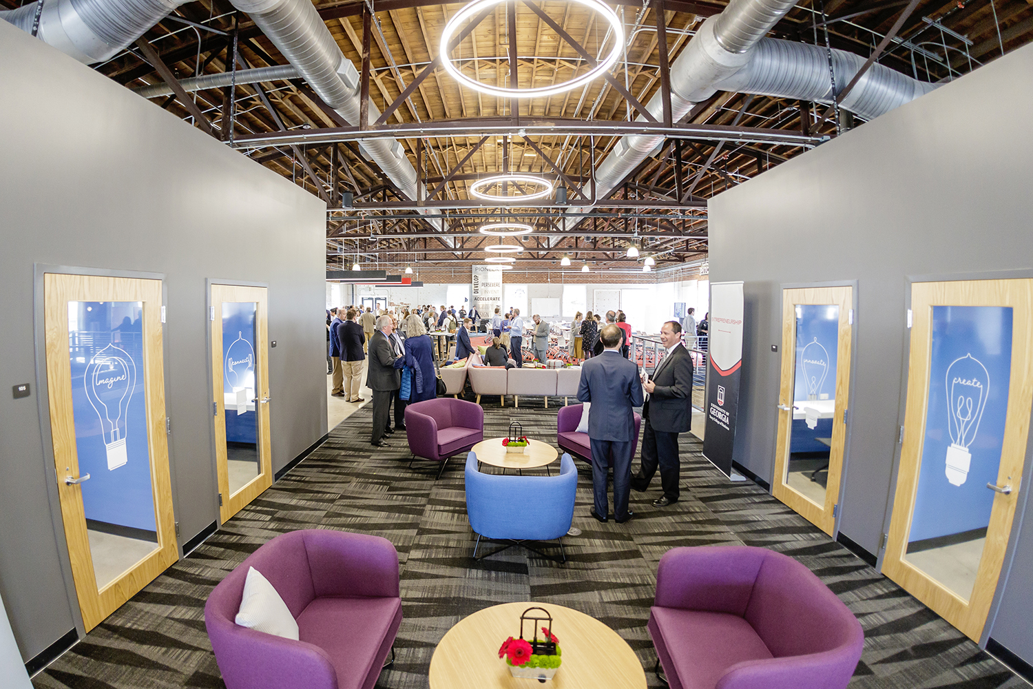 The Studio 225 interior with a meeting area and offices.