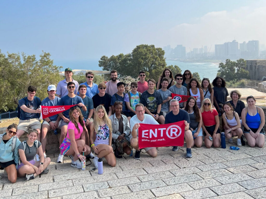 Group photo of two dozen or so students who participated in study abroad program in Tel Aviv