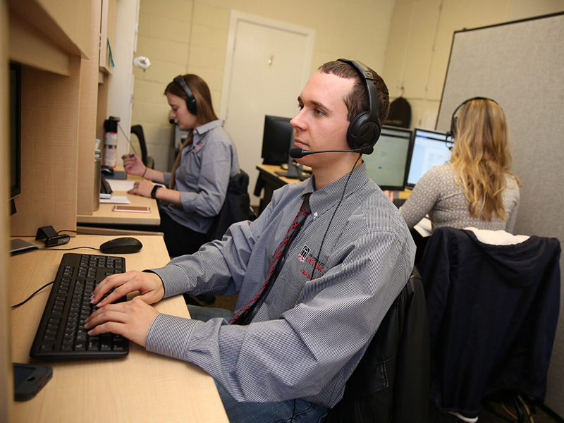 Students work in the VITA hub in 2018. In 2020