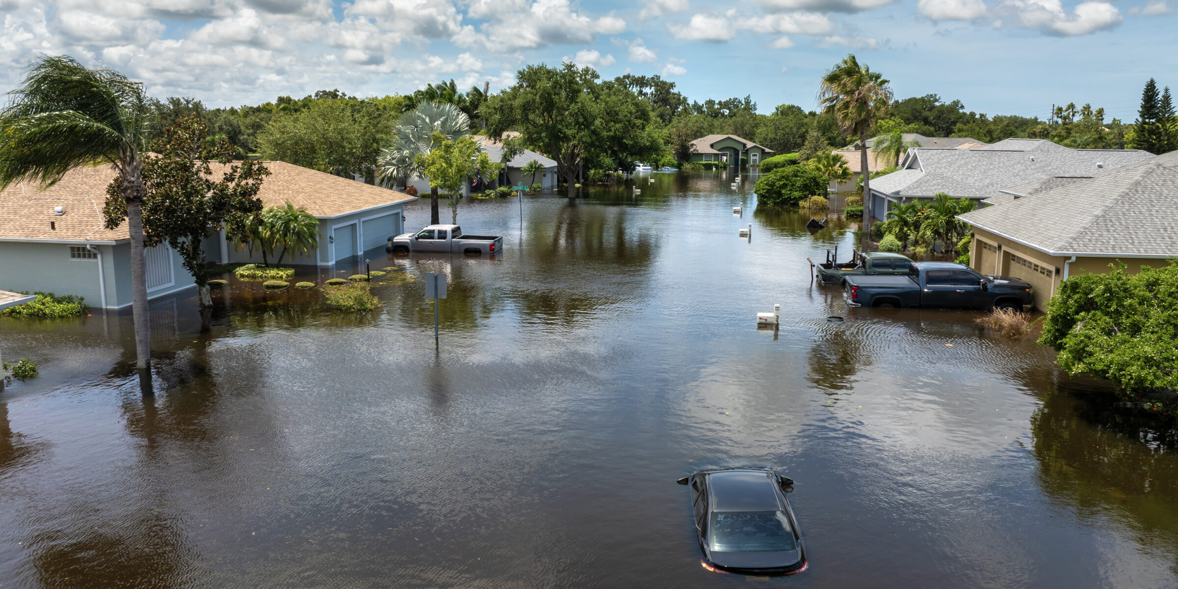 A residential street in Florida flooded after a hurricane. The University of Georgia and Duke University are partnering with leaders from the insurance and climate data industries to launch the Center for Innovation in Risk, Catastrophes, and Decisions (CIRCAD), a new initiative focused on insurance innovation and large-scale climate risk mitigation research.