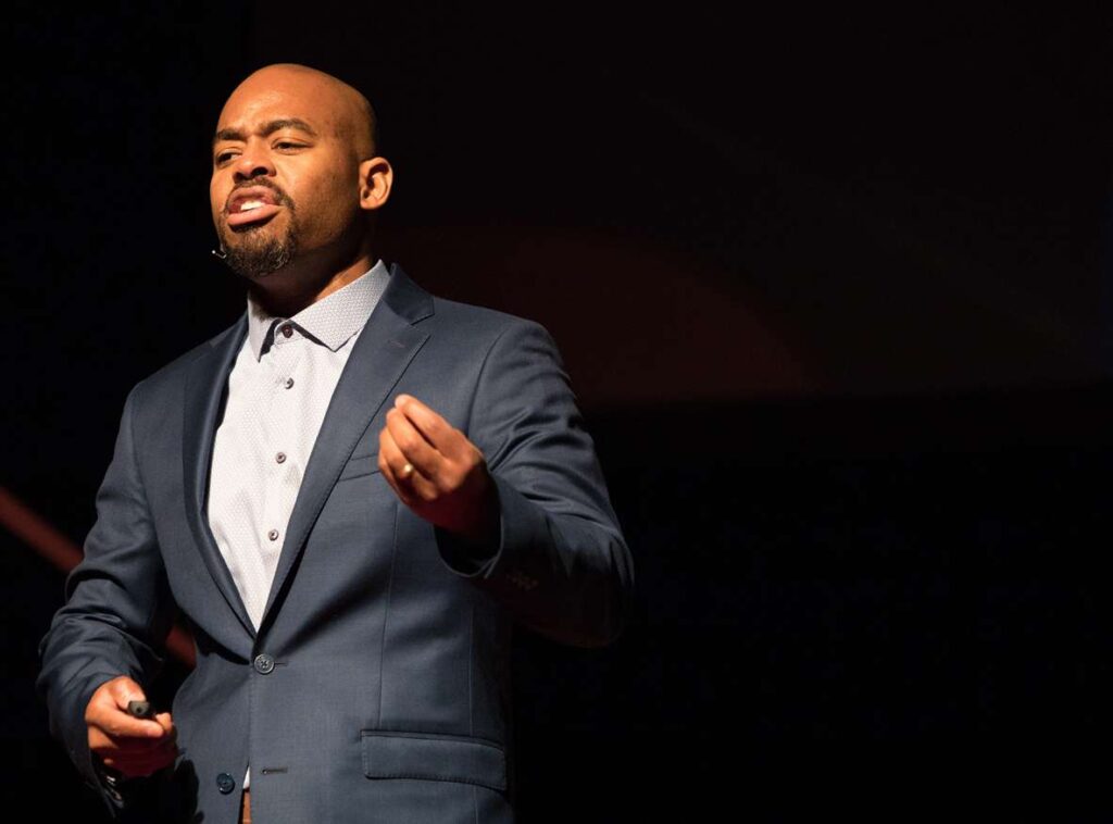 Godfrey Powell speaks to his audience during a TEDxUGA event.