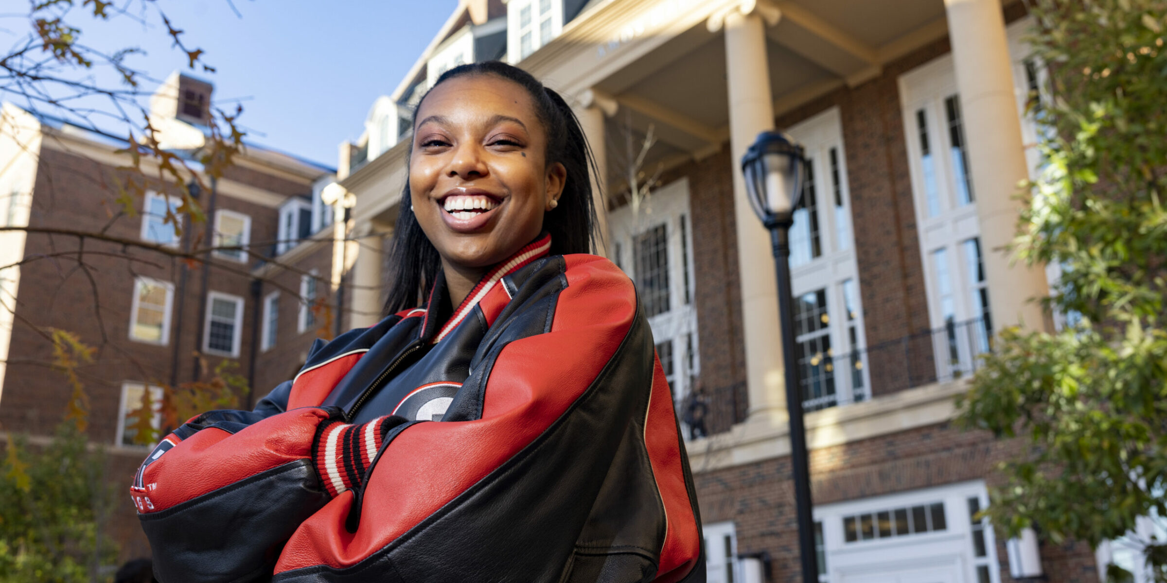 Haley Rose in front of the Terry Business Learning Community