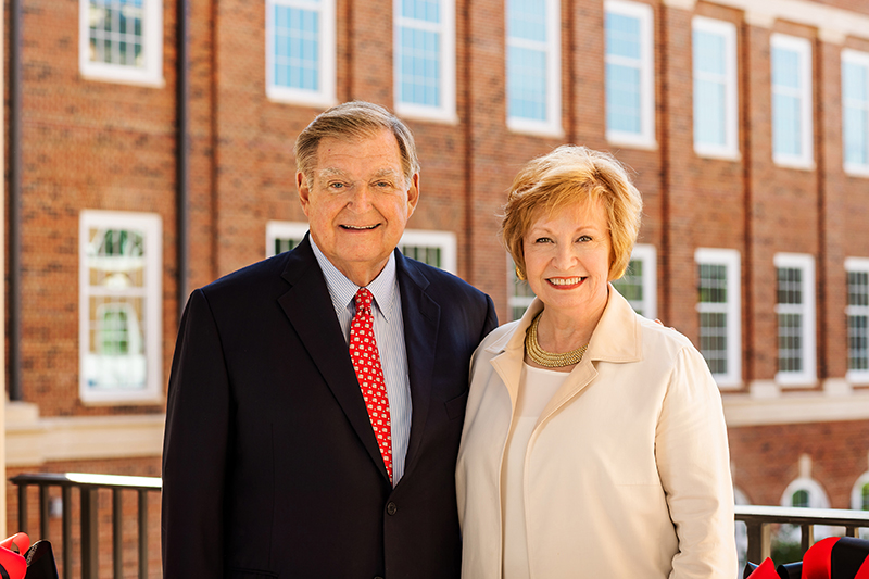 Doug and Kay Ivester in front of Ivester Hall during the Phase III dedication of the Business Learning Community in September.