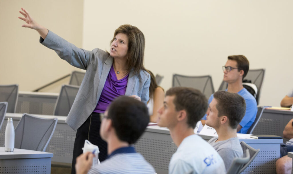 Terry College professor Jacqueline Hammersley instructs students during a lecture.