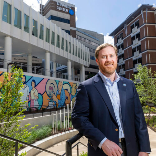 Jamie Shepherd stands in front of The Shepherd Center in Atlanta.