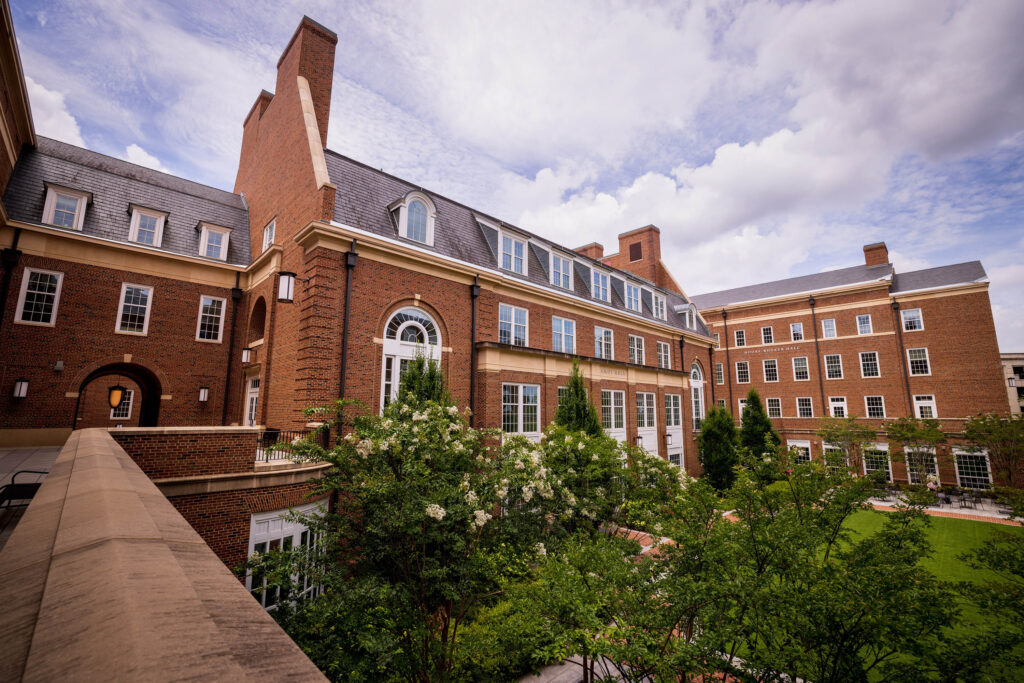 An outdoor photo of the Business Learning Community during a cloudy day.