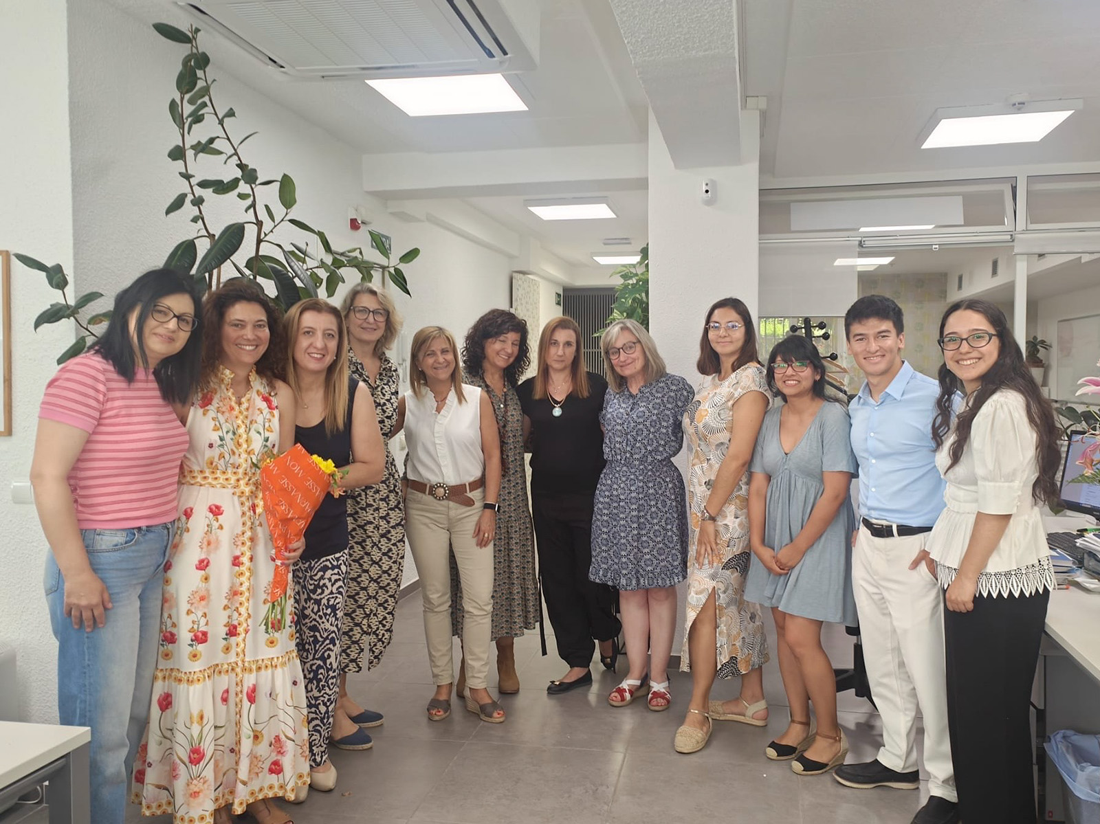 Michael Lee poses with his office mates from Debe Haber Asociaciones in Madrid. He worked in the consultancy for non profits as part of worked in a consultancy for nonprofits as part of a Terry College international business internship program.