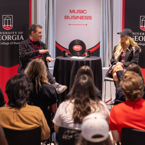 Megan Moroney talks to David Barbe in front of a crowd of UGA students in the Steling Study.