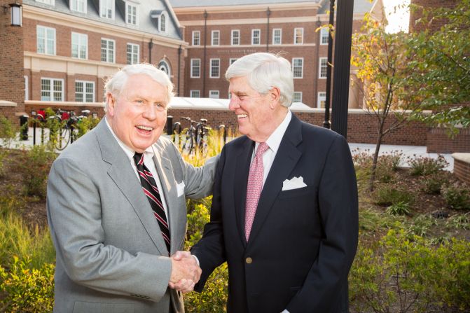 Two happy men shaking hands