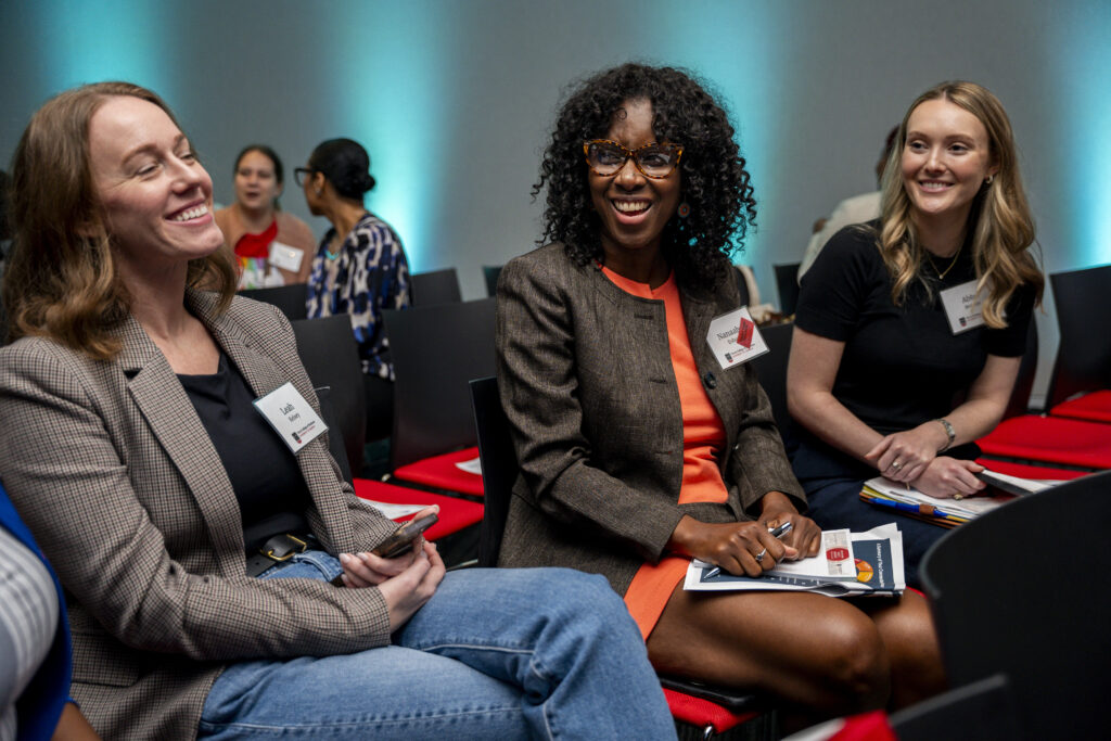 Three women smiling