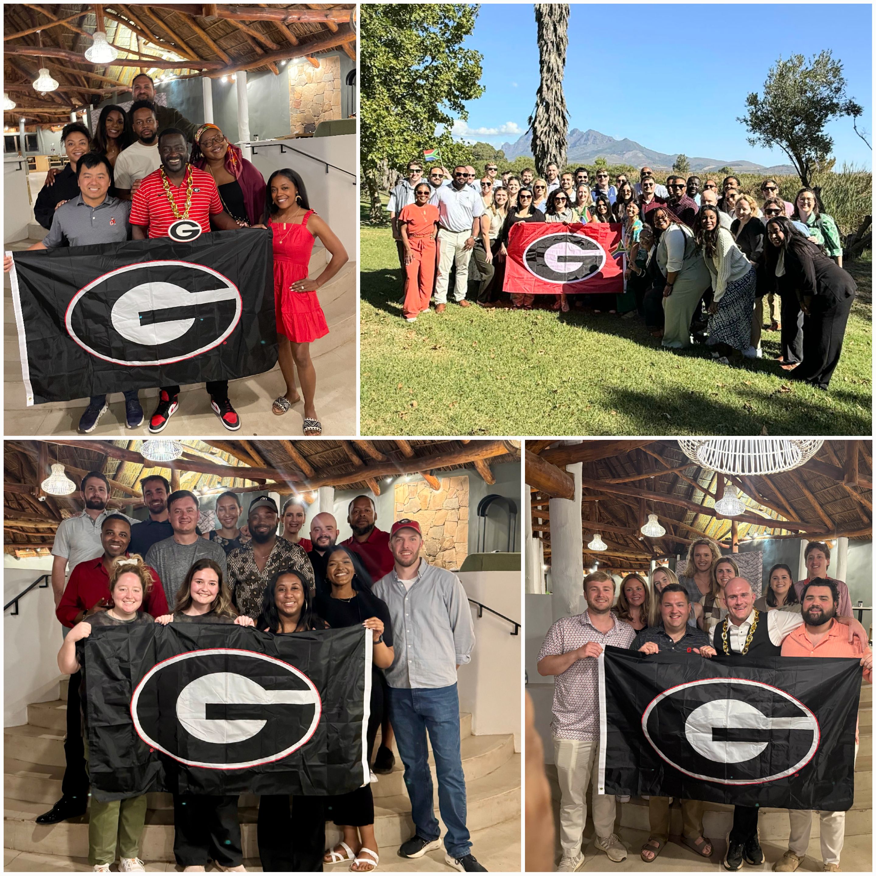 Terry MBA students hold University of Georgia flags during their residency trip to South Africa.