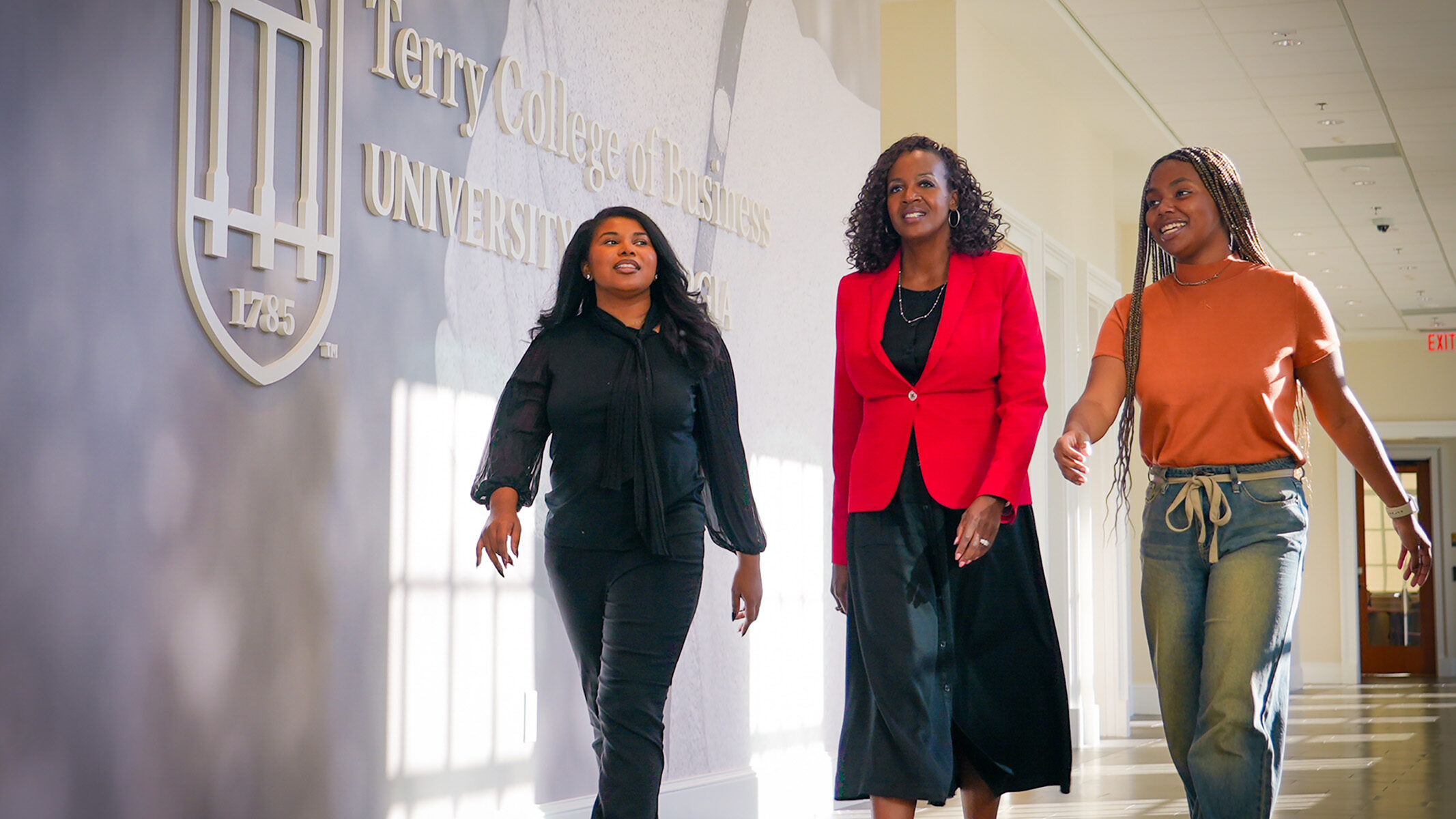 Rachel walks through the BLC with two mentees
