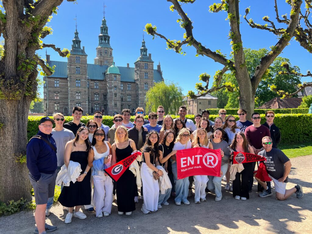 UGA students in group standing in front of Rosenborg Palace in Denmark