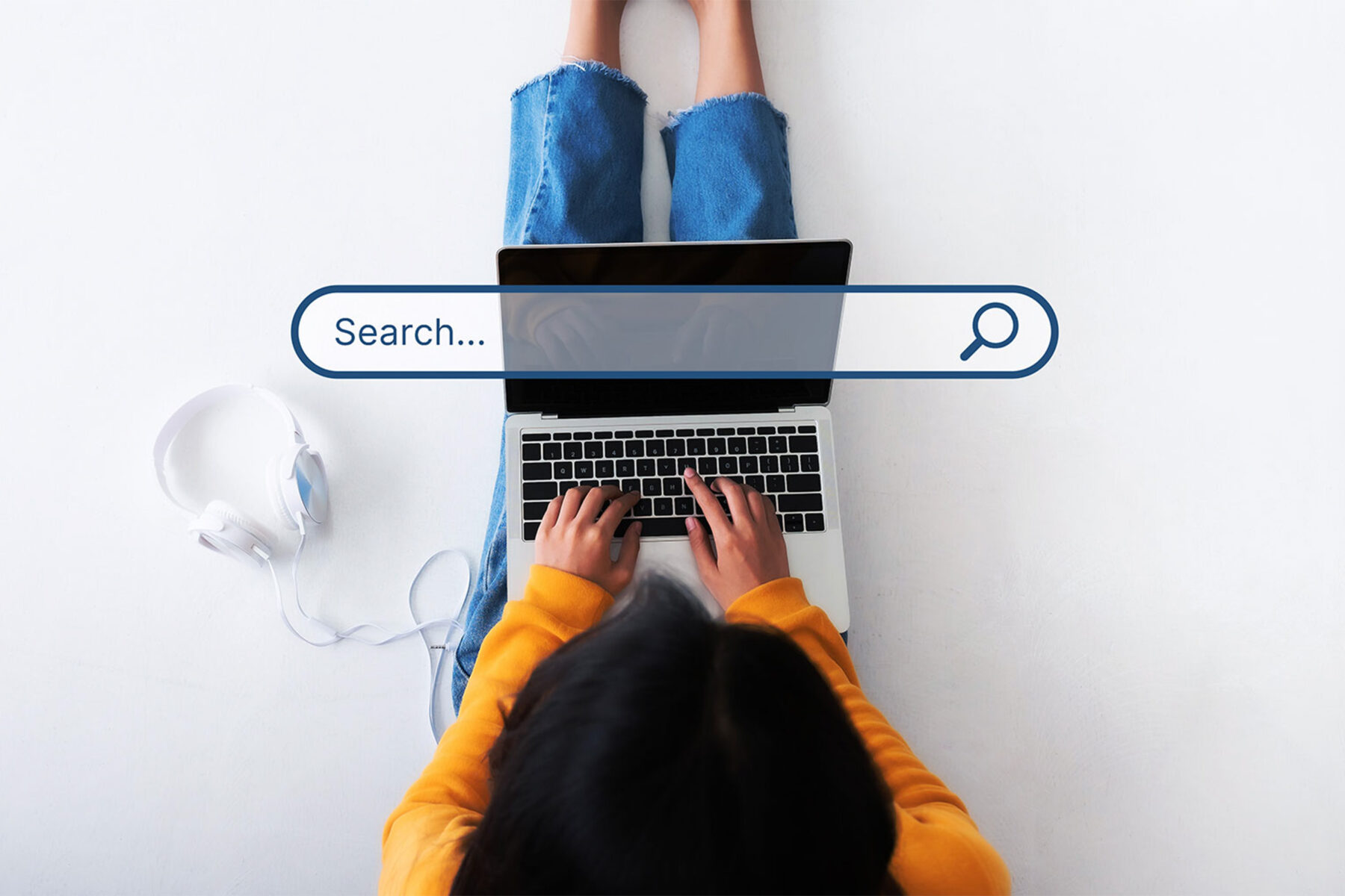 A woman sits on the ground with her laptop using a search engine. A search engine bar is projected into the center of the image.