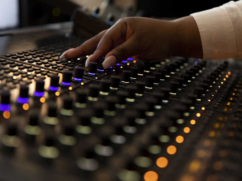 Hand on a soundboard