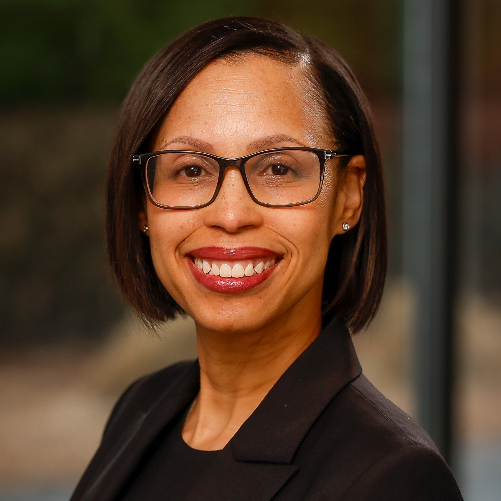 Headshots of Carmen Taylor